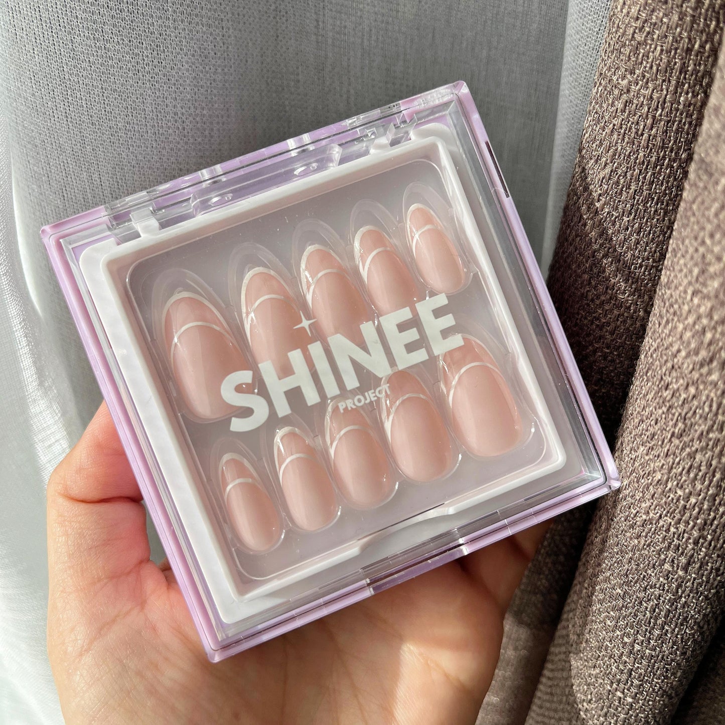your go to press on nails - best press on nails nz - almond shape nails and nude colour nails