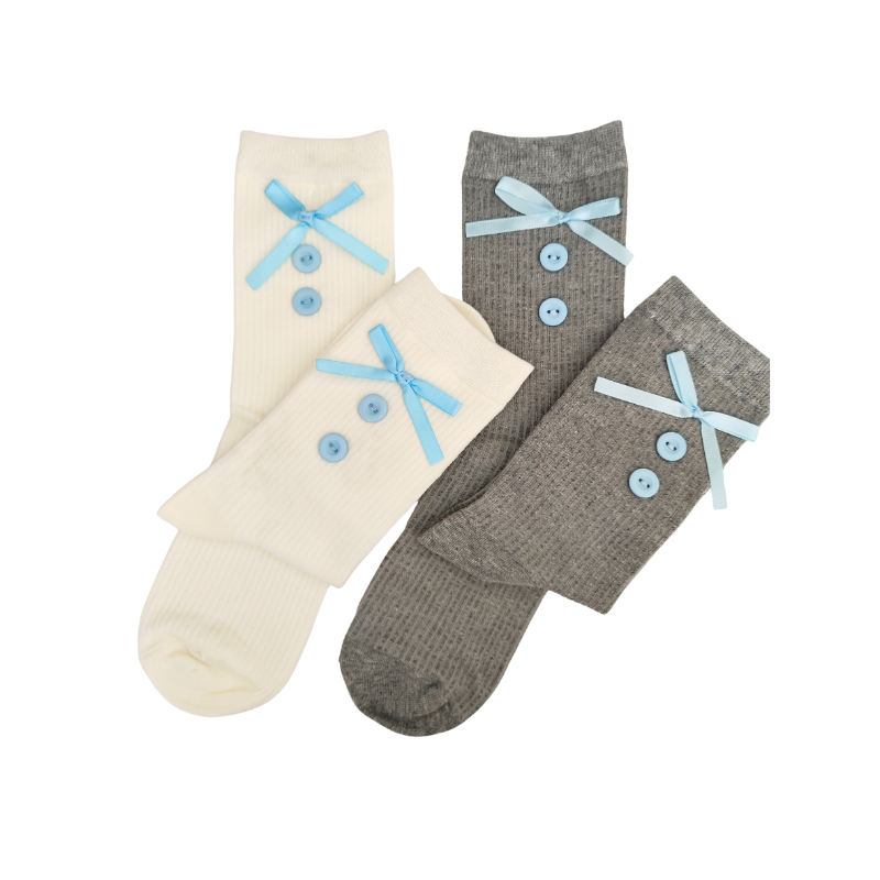 Two pairs of socks, one beige and one gray, with blue buttons on a white background.