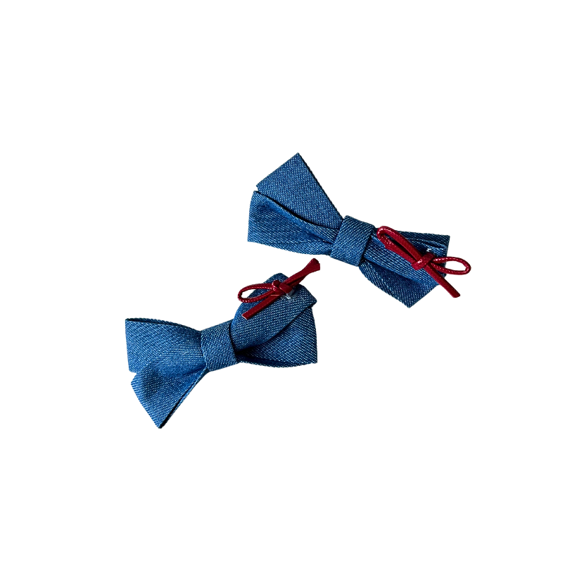 A sweet 2‑piece blue bow hair clip set featuring denim‑style bows topped with tiny red ribbons — perfect for soft‑girl, kawaii, and everyday cute hairstyles.