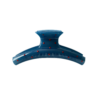 A super cute blue claw clip sprinkled with tiny red dots — playful, sweet, and perfect for every girl who loves a little pop of color in her everyday hairstyle.