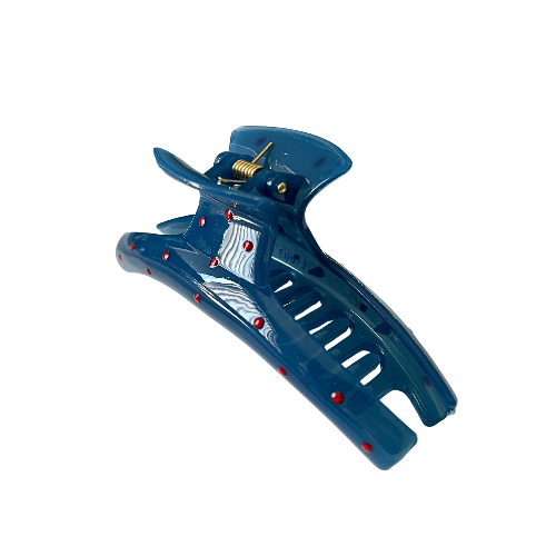 A super cute blue claw clip sprinkled with tiny red dots — playful, sweet, and perfect for every girl who loves a little pop of color in her everyday hairstyle.