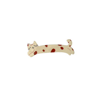 A sweet cream‑coloured cat hair clip decorated with red spots — playful, girly, and perfect for soft‑girl and kawaii hairstyles.