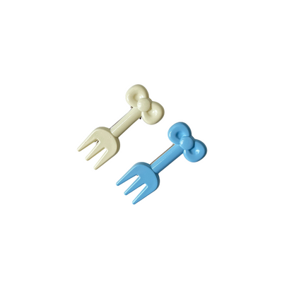 A playful hair clip duo shaped like tiny forks in cream and blue — cute, quirky, and perfect for soft‑girl and kawaii hairstyles.