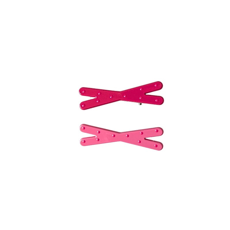 A cute 2‑piece pink hair clip set featuring bow‑shaped grip clips in two shades of pink — perfect for soft‑girl, kawaii, and everyday sweet hairstyles.