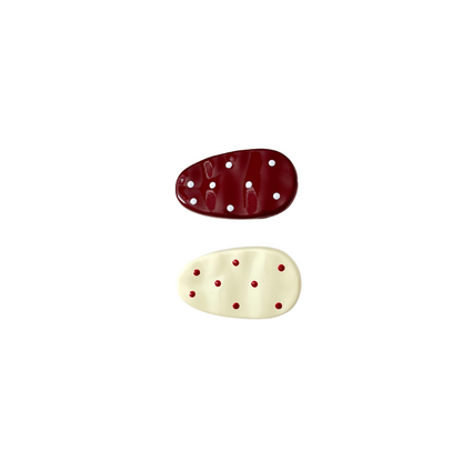 A glossy, soft‑girl bow hair clip available in two adorable colour options — Cream White with Red Dots or Red with White Dots. Cute, playful, and perfect for everyday girly styling.
