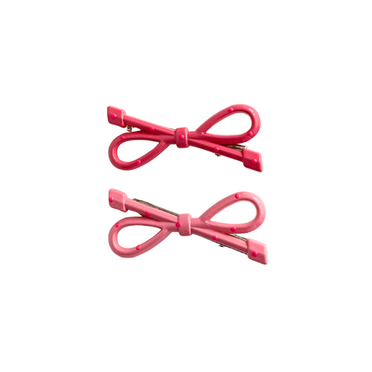 A super cute duo of glossy bow hair clips - available in White & Red or Pink tones. Perfect for soft‑girl, kawaii, and everyday girly hairstyles.