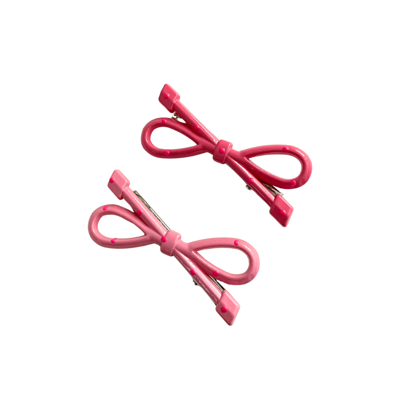 A super cute duo of glossy bow hair clips - available in White & Red or Pink tones. Perfect for soft‑girl, kawaii, and everyday girly hairstyles.