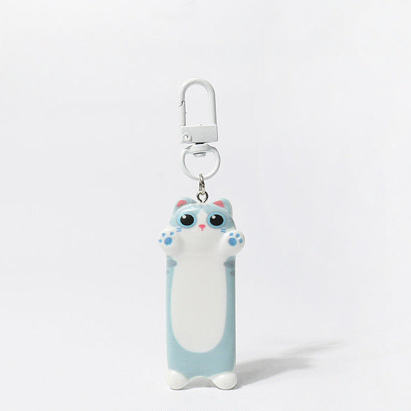 Cartoon cat-shaped keychain on a white background 