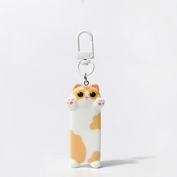 Cat-shaped keychain on a white background 