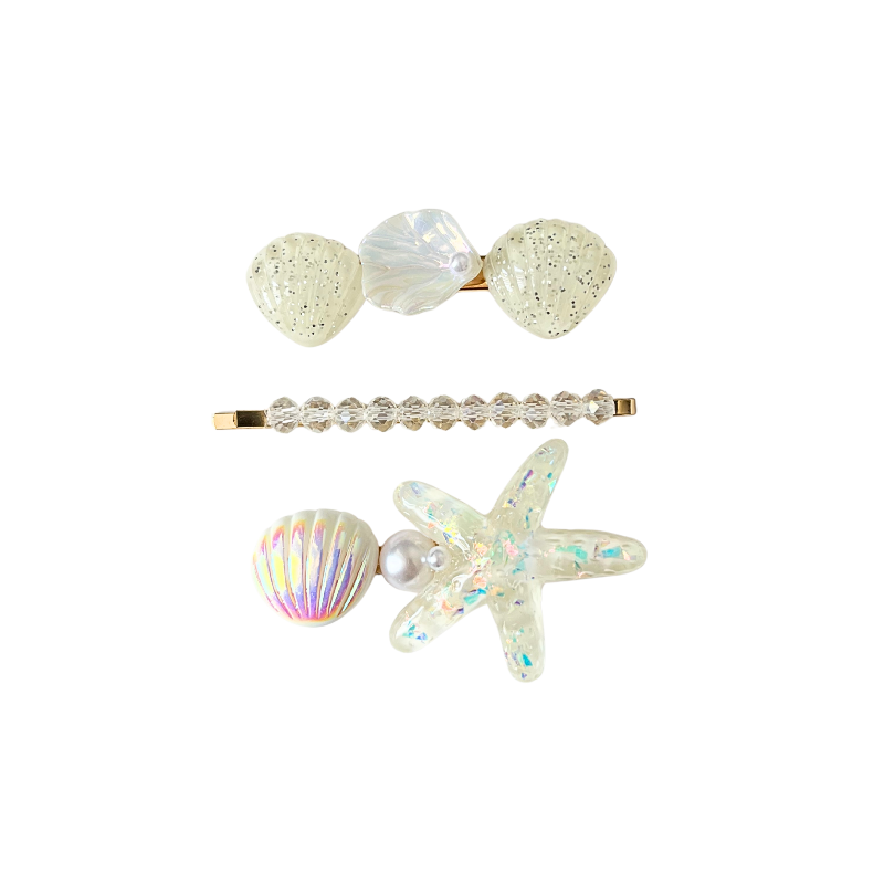 A dreamy 3‑piece ocean‑themed hair clip set featuring shells, pearls, and a sparkling starfish — perfect for soft‑girl, mermaidcore, and elegant kawaii hairstyles.
