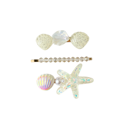 A dreamy 3‑piece ocean‑themed hair clip set featuring shells, pearls, and a sparkling starfish — perfect for soft‑girl, mermaidcore, and elegant kawaii hairstyles.