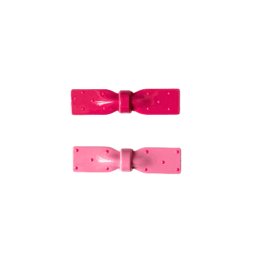 Two adorable pink bows — one deep pink, one soft pastel — both decorated with tiny raised dots for the perfect girly look.