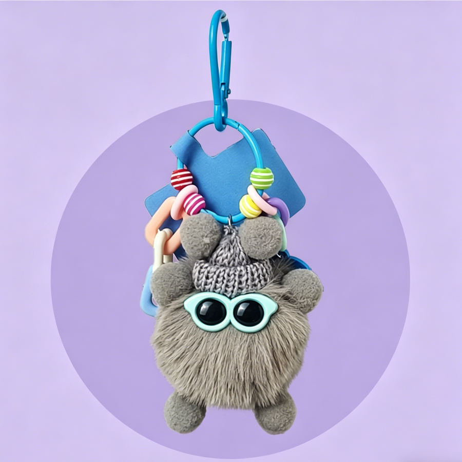 Fluffy plush bag charms in pastel colours, each with a knitted hat, sunglasses, colourful beads, and a matching clip.
