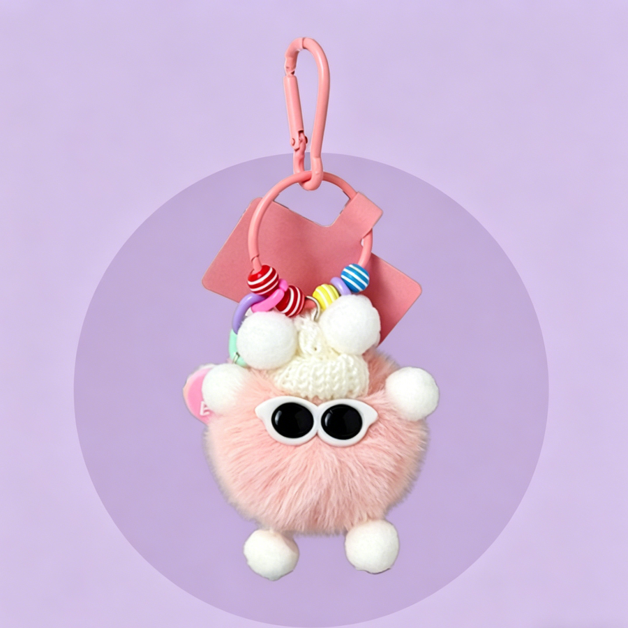 Fluffy plush bag charms in pastel colours, each with a knitted hat, sunglasses, colourful beads, and a matching clip.